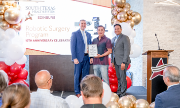 Juan Enriquez receiving his all-star award 