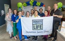 South Texas Health System Edinburg employees holding a donate life banner